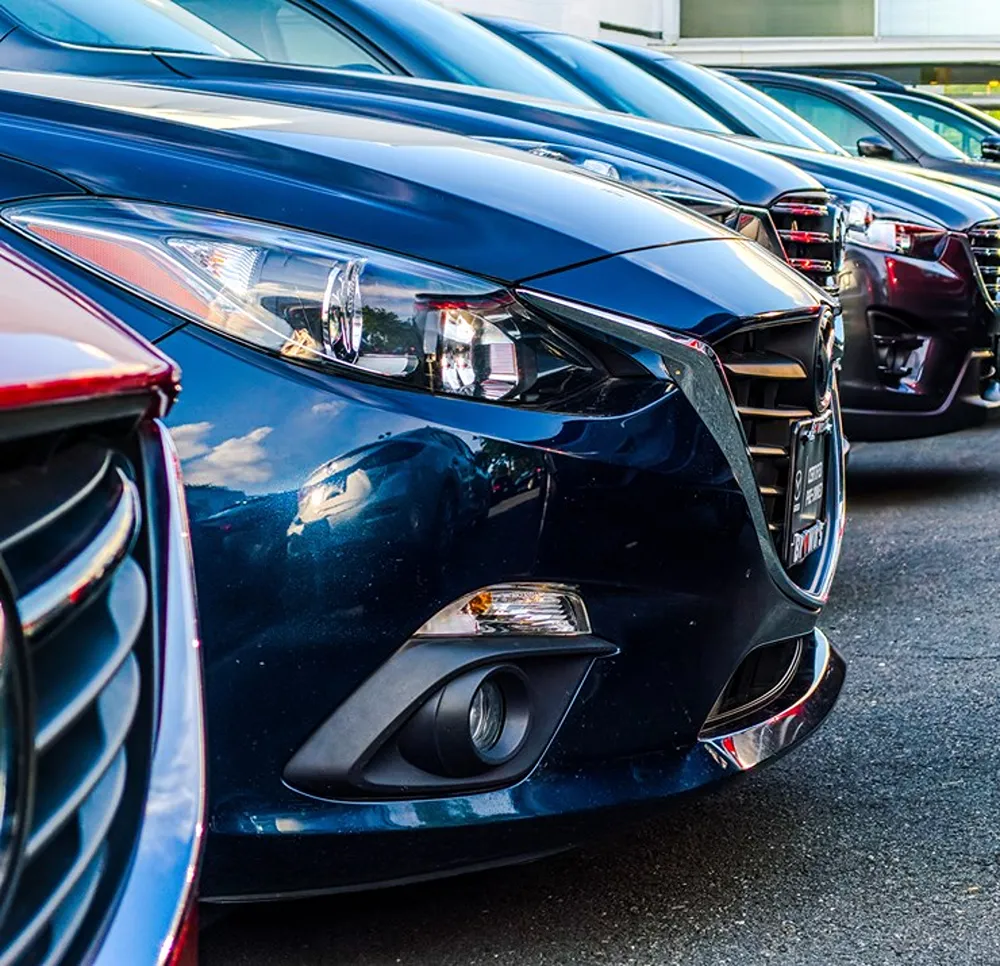 Several cars lined up in a row.