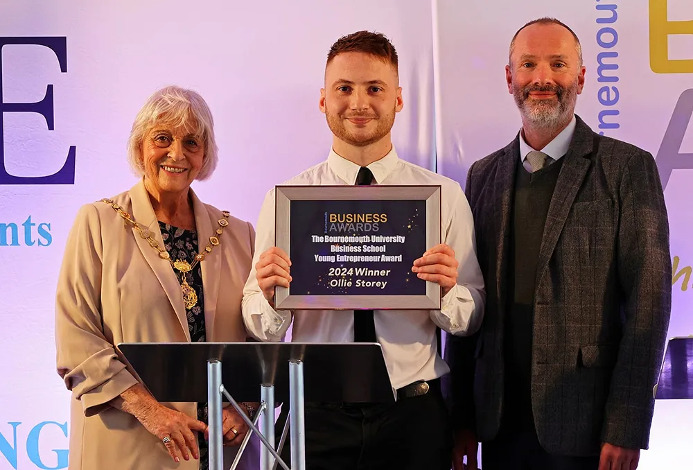 Ollie Storey on stage at 2017 Bournemouth Business Awards accepting the Young Entrepreneur Award