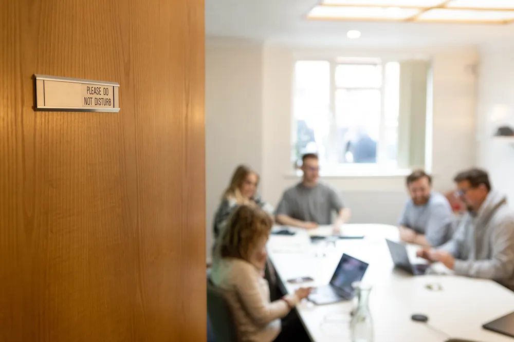 Cold Banana staff in a monthly team meeting