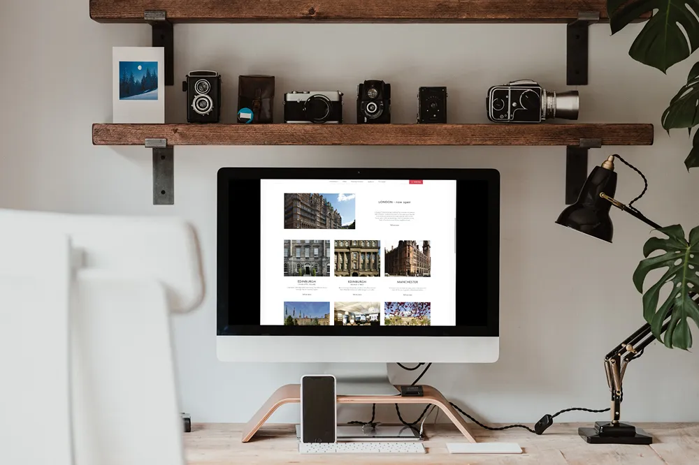 Ph Hotels homepage open on a desktop monitor.