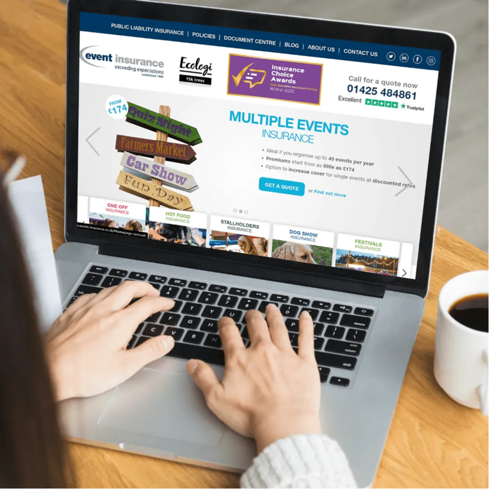 Event Insurance homepage open on a laptop.