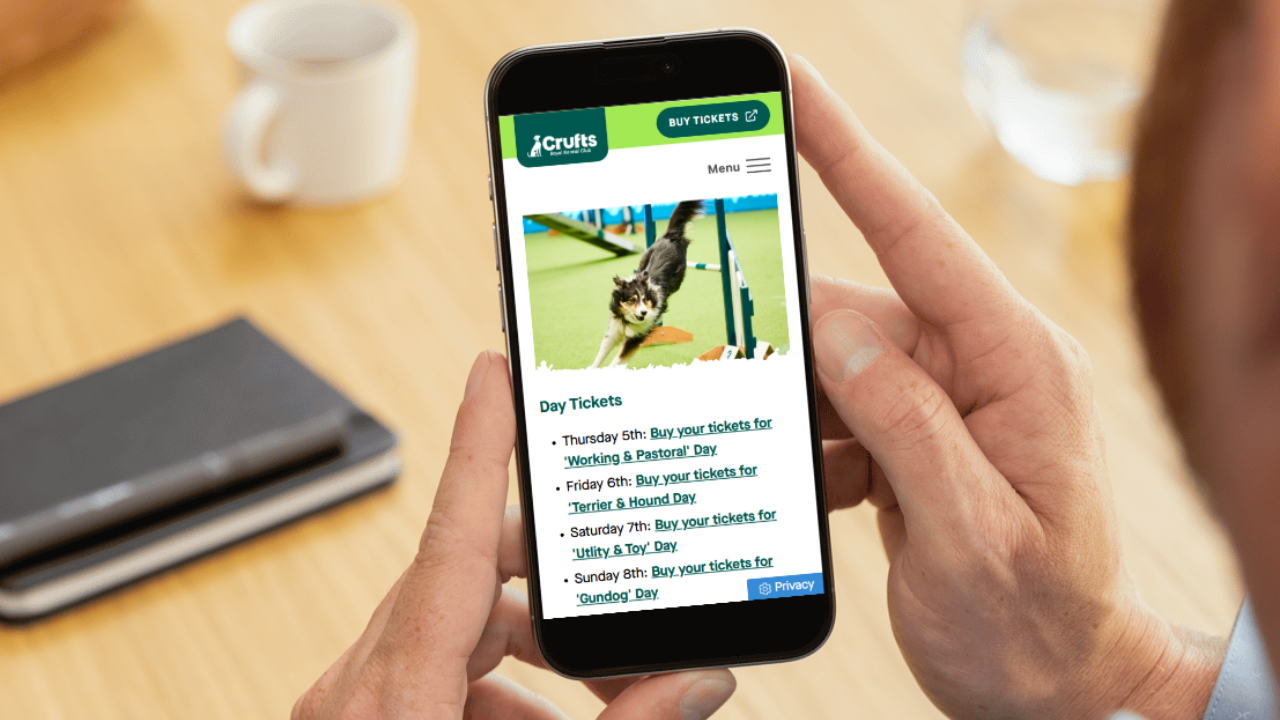 A screenshot of the Crufts website on a mobile device, with the website showing day tickets for the 2026 Crufts live event