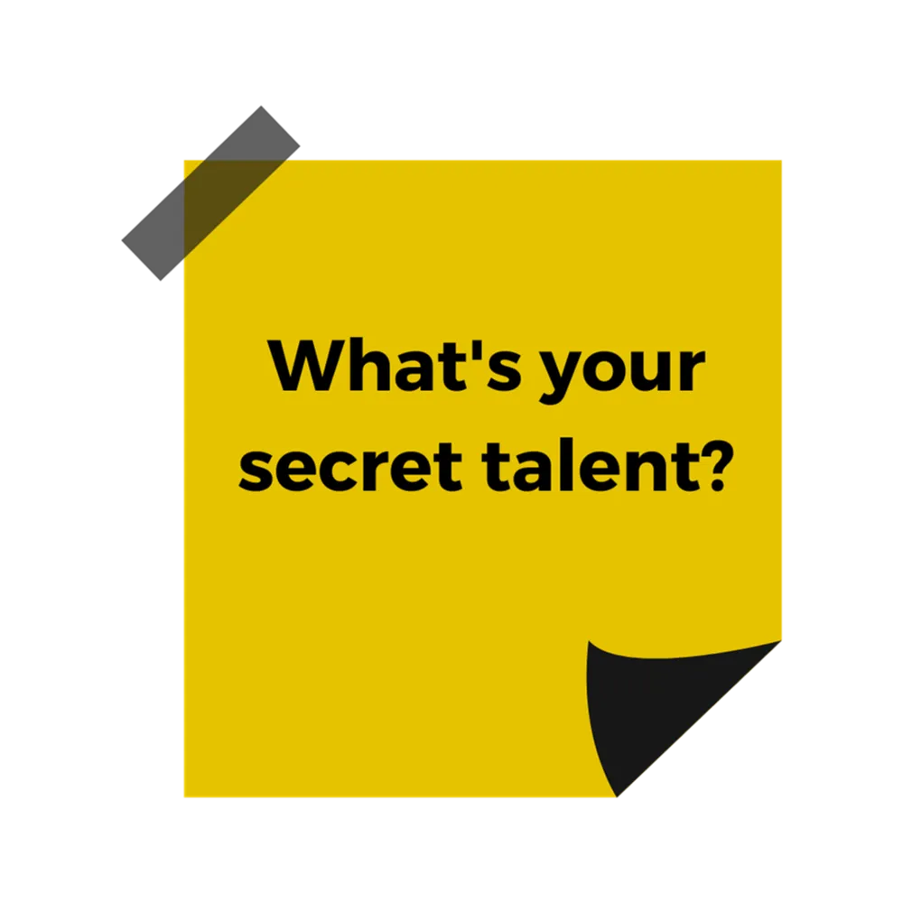 A yellow post it note with black text reading "What's your secret talent?"