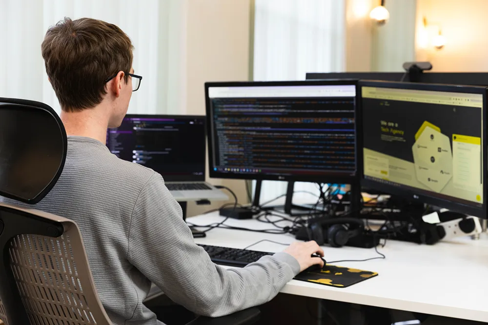 A Cold Banana employee working at their desk
