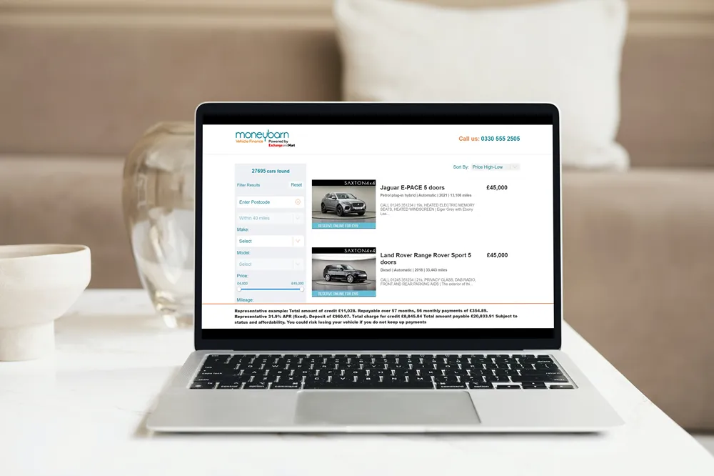 Moneybarn Vehicle Finance website on a laptop