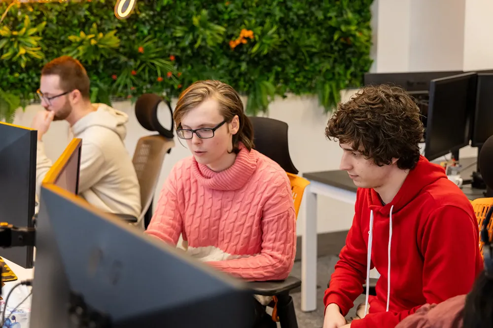 Two Cold Banana employees having a discussion