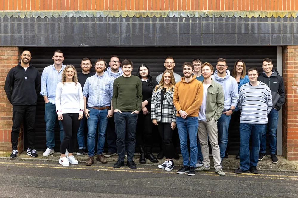 A group photo of Cold Banana employees together outside