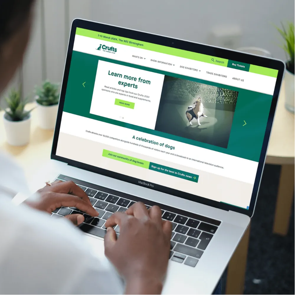 A Crufts webpage open on a Macbook Pro laptop device.