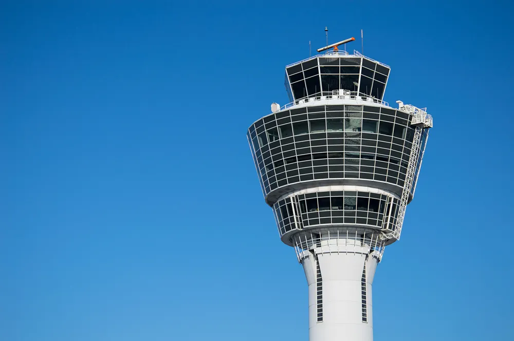 Air traffic control overseeing operations of an airport runway.