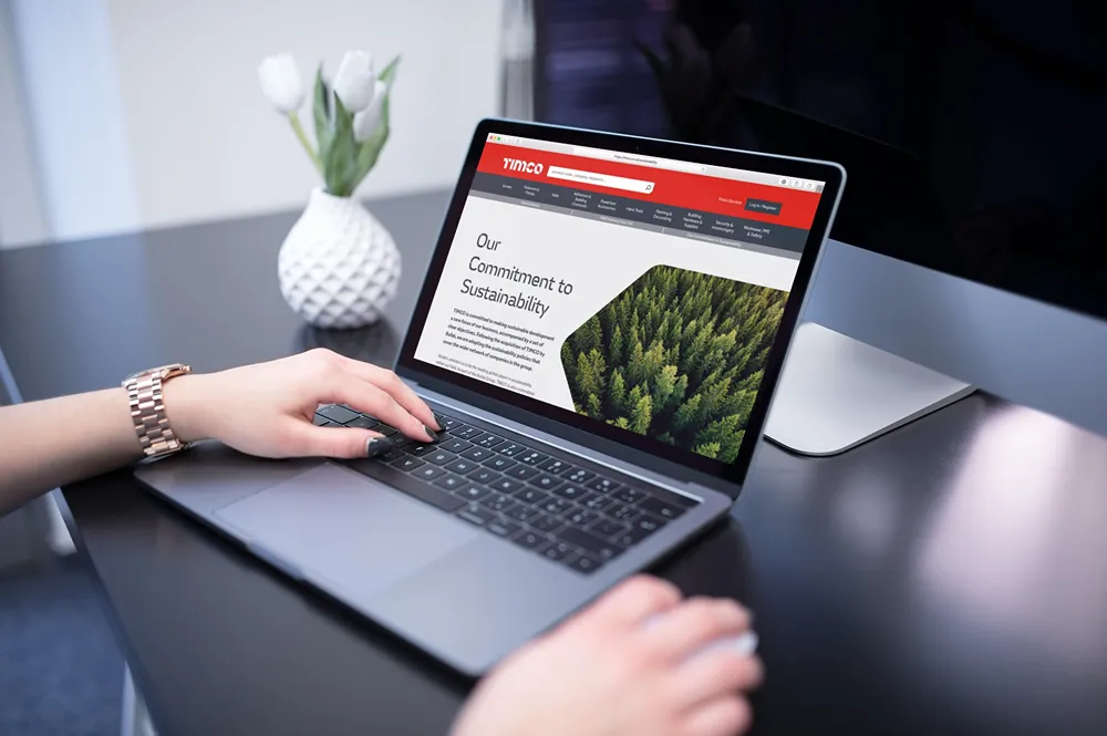 TIMCO "Our Commitment to Sustainability" webpage open on a laptop device.