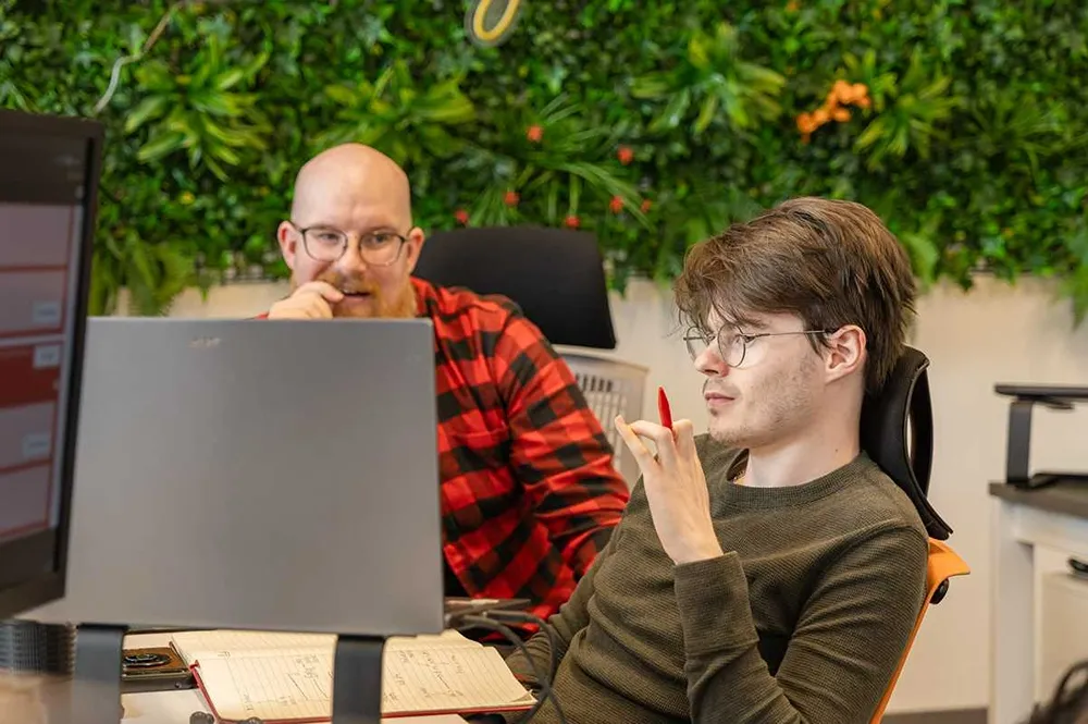 Two Cold Banana employees having a discussion