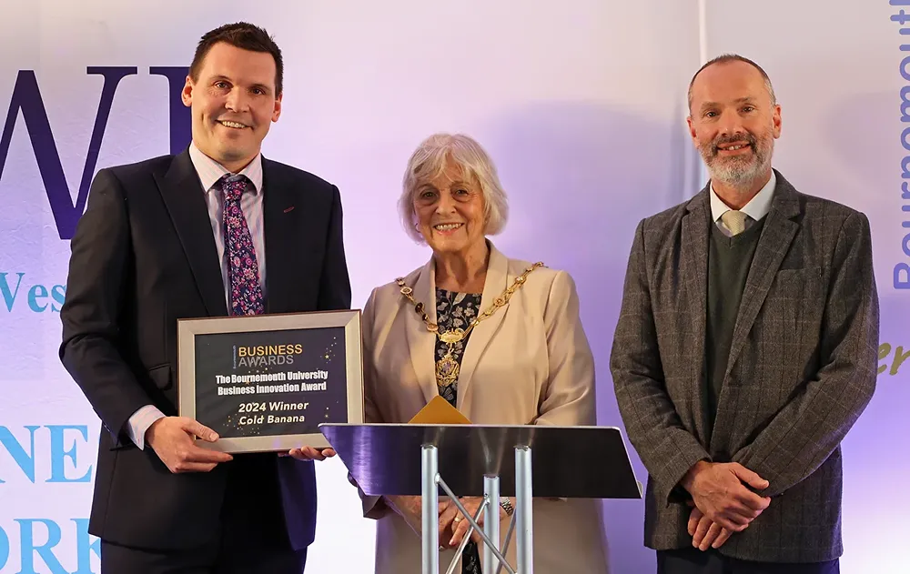 Cold Banana Founder and CEO Luke Fribbens accepting The Bourrnemouth University Business Innovation Award in 2024
