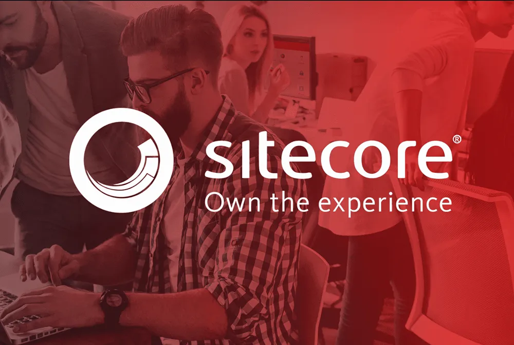 A Sitecore graphic with a white Sitecore logo with the tagline "Own the experience"