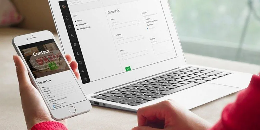 Contact Us forms open on both a smartphone device and a laptop