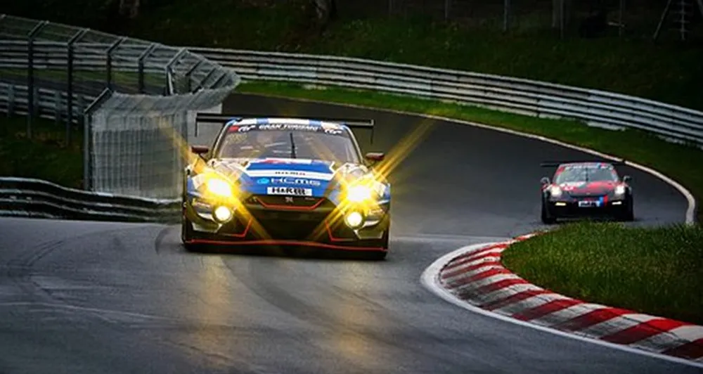 Two cars racing on a racetrack