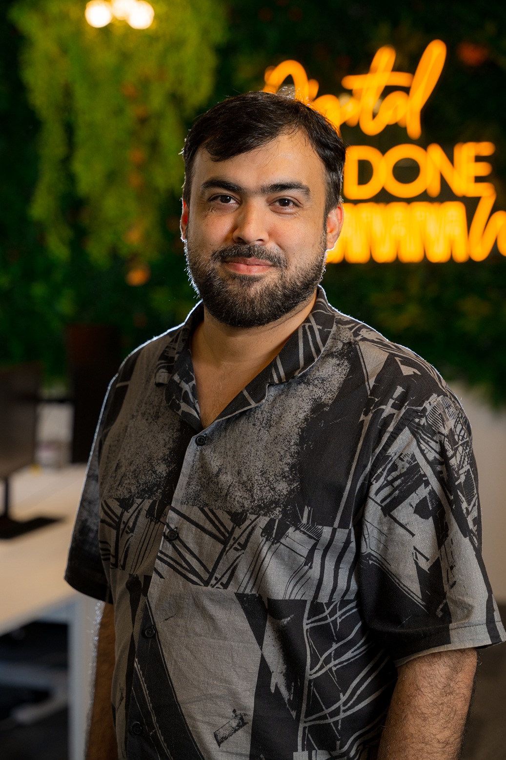 A headshot of Ammar Naich in the Cold Banana Bournemouth HQ
